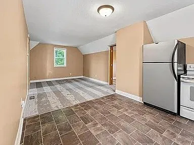 Photo of dining room looking into the freshly shampooed living room
