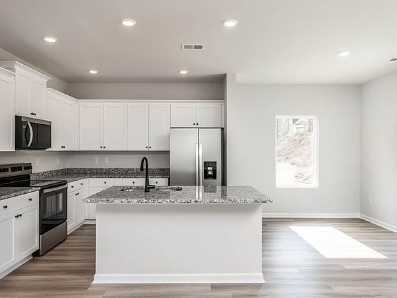 Enjoy a quick meal at the spacious breakfast bar.