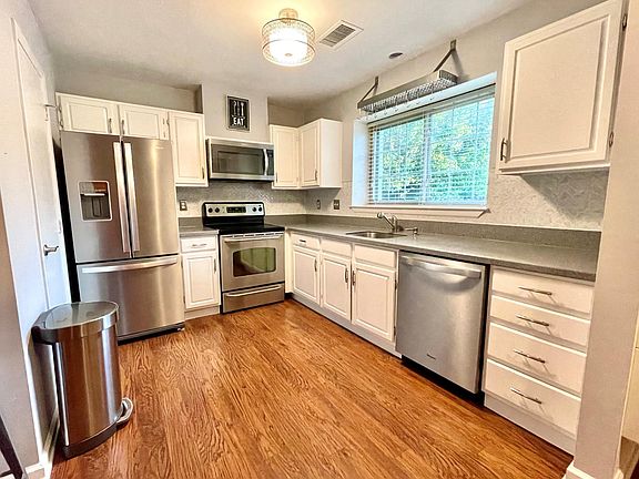 Kitchen with peninsula open to living/dining room