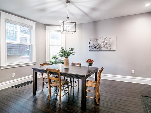 This nicely-sized dining room has tons of natural light and plenty of space for entertaining!