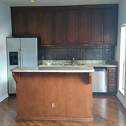 kitchen open to dining/living area