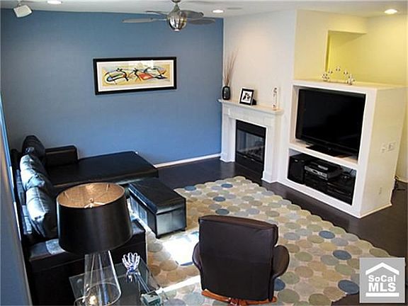 Custom media niche, 5-speaker surround; wired to speakers on 1st and 3rd floor