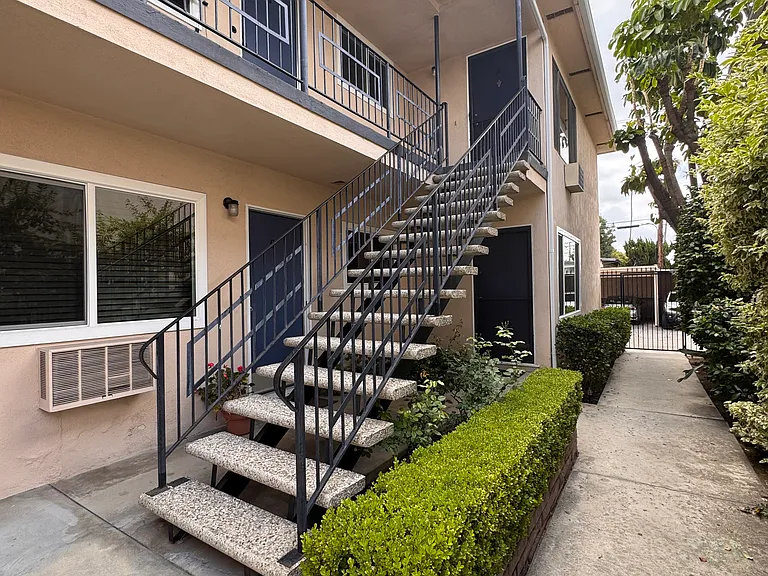 Second floor unit. Gated courtyard.