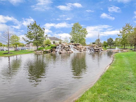 Take a stroll around the lake that is behind the home!