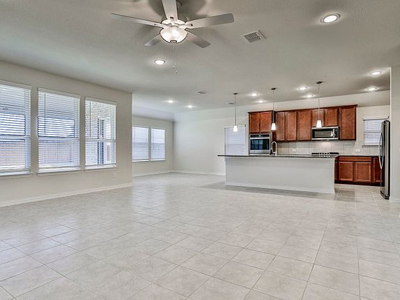 Open island kitchen overlooks living area