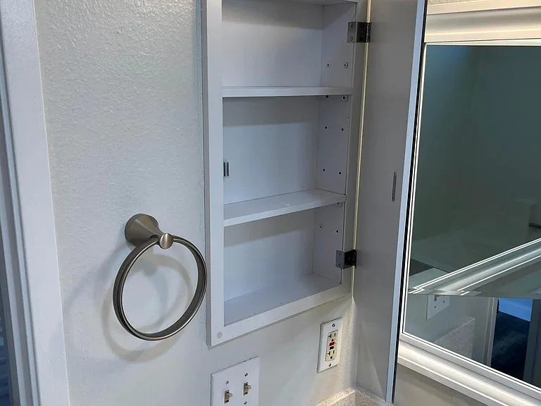 New medicine cabinets in both bathrooms