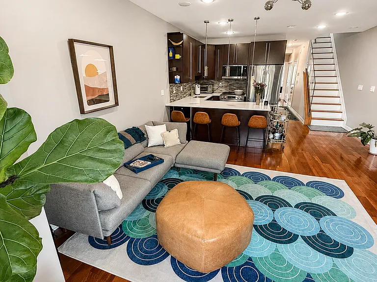 Open-concept living, dining, and kitchen layout