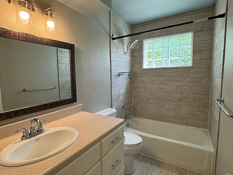 Guest bathroom with shower and tub