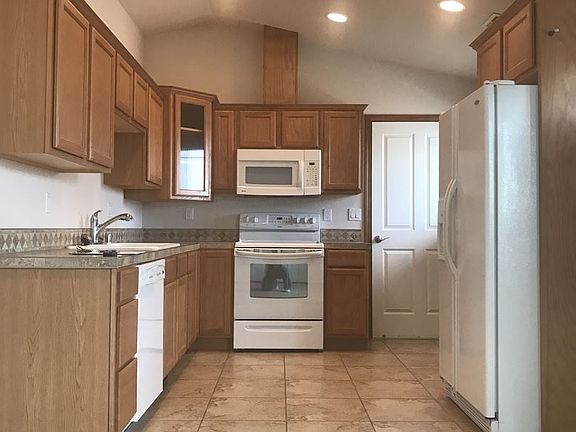 3rd image of 7524 McDougal Ave NE APT A