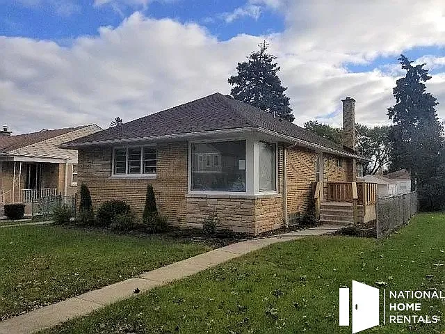 8147 N Ozanam Ave photo 1