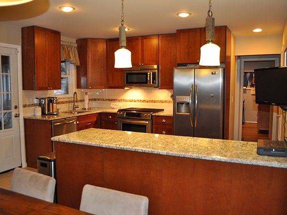 Granite, stainless appliance