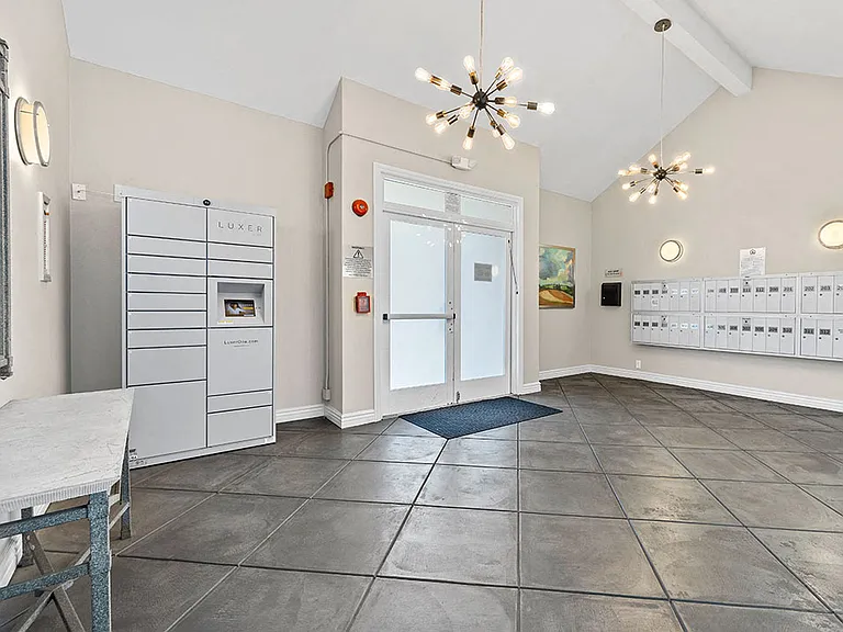 Lobby with secure lockers for resident package delivery.