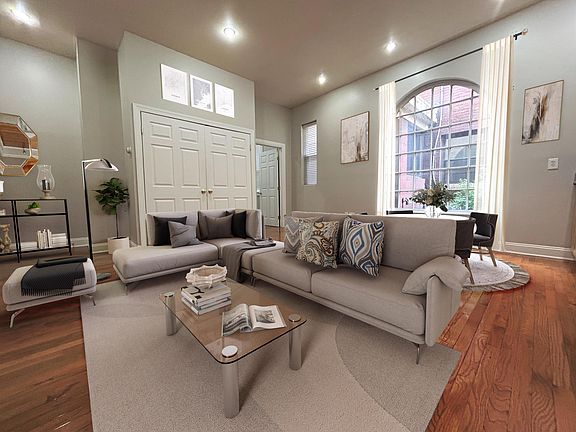 Gorgeous Living Room w/ high ceilings and fantastic lighting