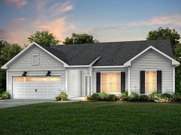 Amberwood Exterior 2 features siding, shakes, covered front door and 2 car garage