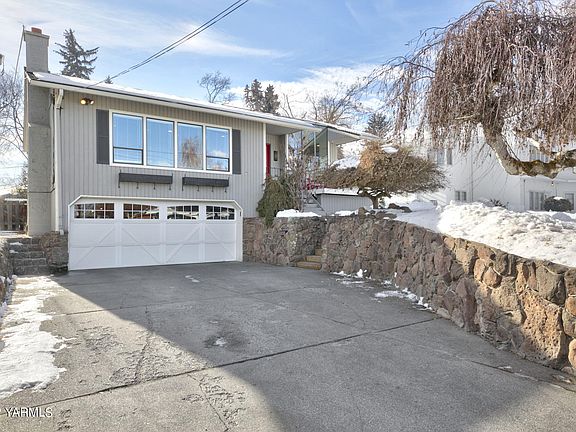Two  bay attached garage and driveway