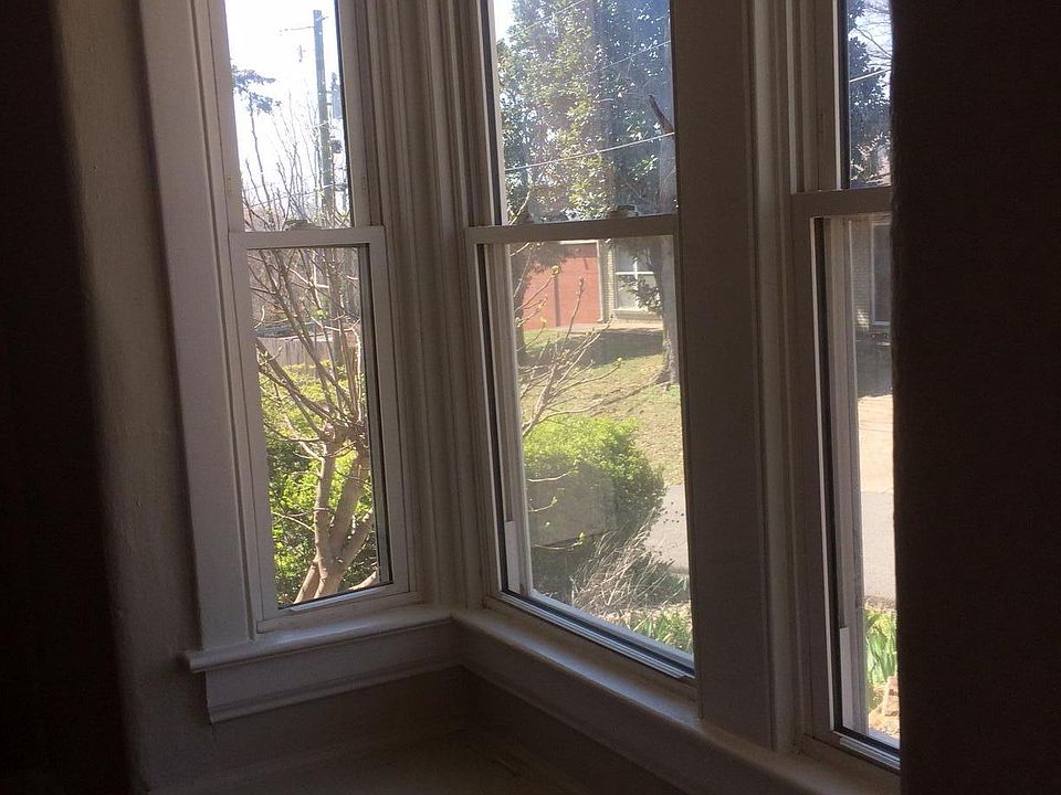 The front room living area includes an lovely bay window sea