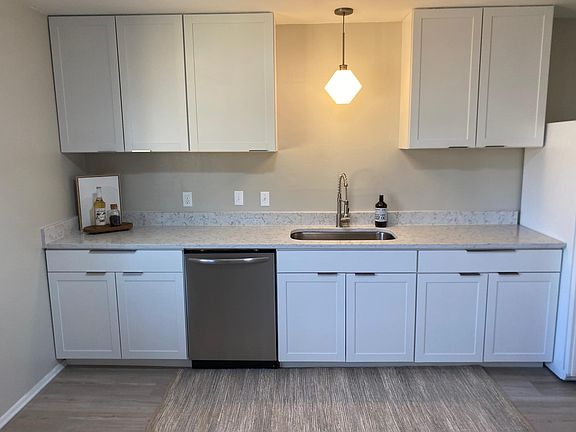 Renovated kitchen with brand new cabinets, granite, and stainless appliances