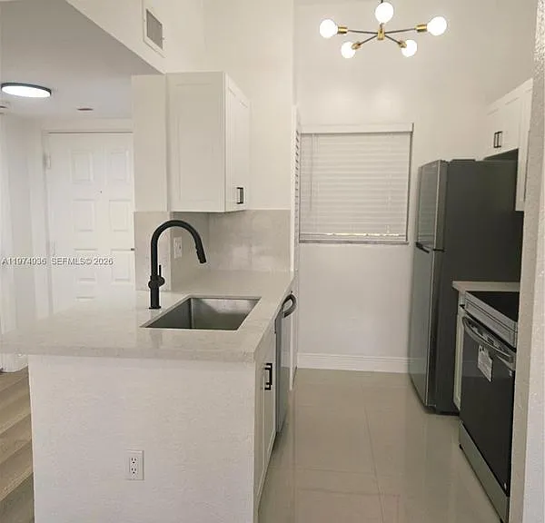 2881 N Oakland Forest Dr #310 — Photo 15