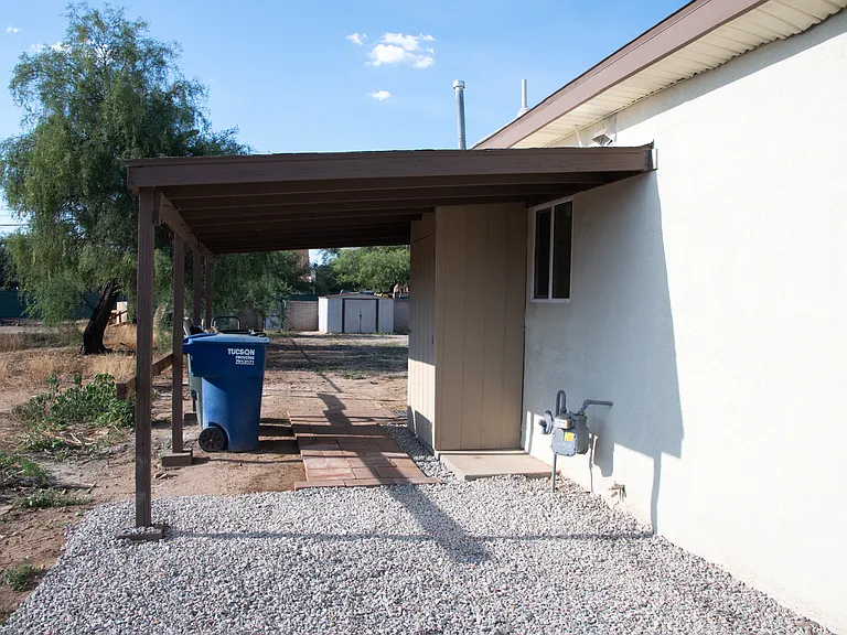 Covered patio leading to master bedroom and backyard.