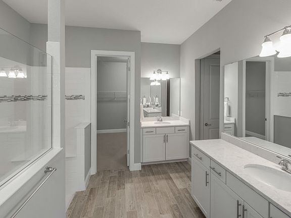 The Aurora is a Spacious New Home with Luxury Bathrooms Built by Pulte