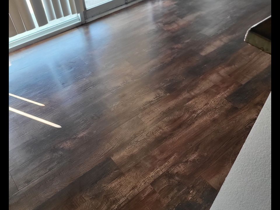 Waiting area with hard surface flooring.