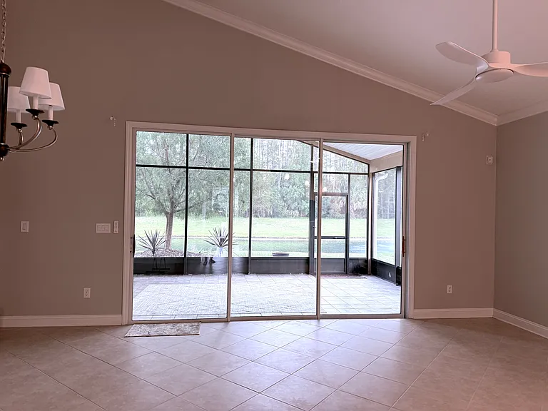 Incredible view of pond and preserve. Very private & serene setting. 62", 6 blade DC Ceiling fan is brand new on patio.