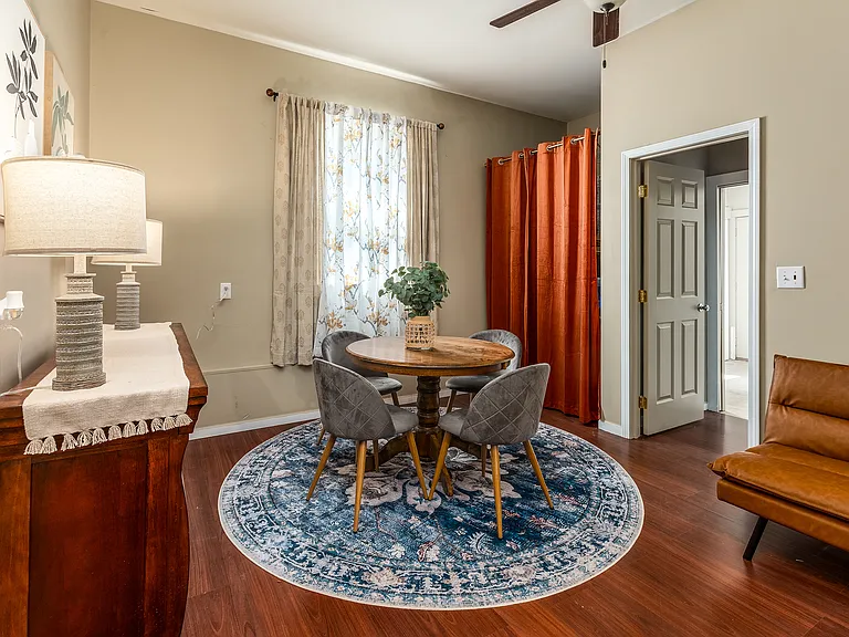 Dining room with pantry behind the curtain