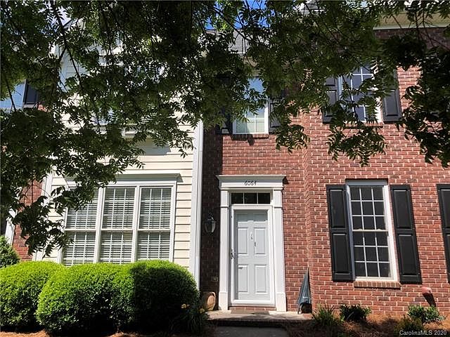 2nd image of 6064 Village Dr NW #8