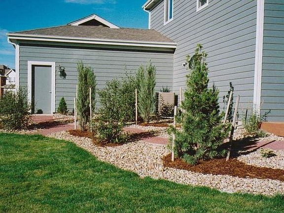Access door from back yard to the triple garage.