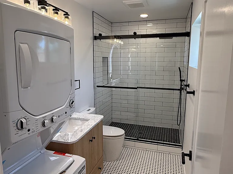 brand new large size shower, washer dryer.