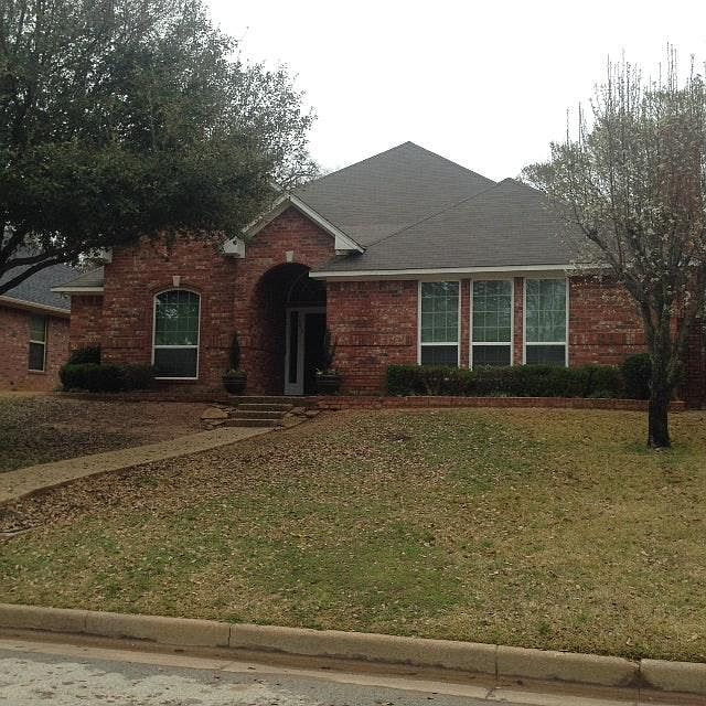 Great location off Rice Road. Rear, alley entrance to double garage. Sprinkler System. Wired for Security System.