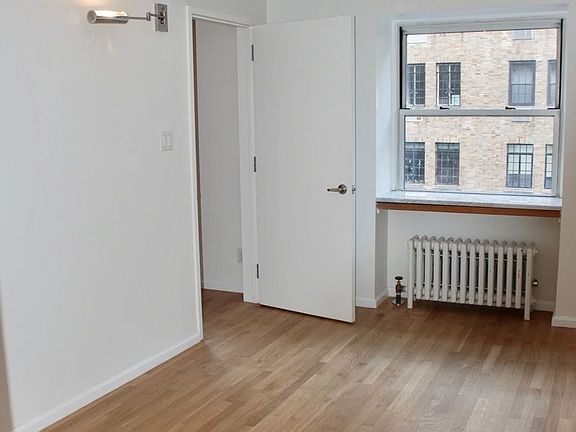 5th image of 51 E 10th St APT 8