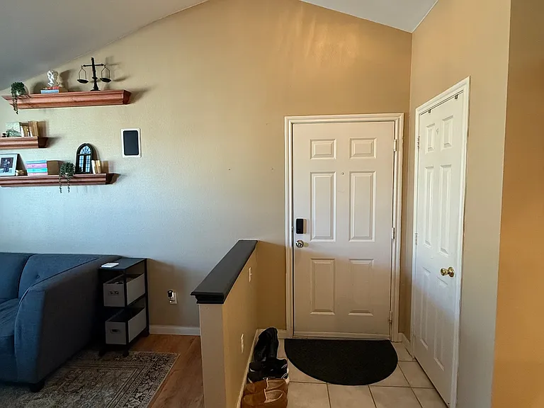 View standing in the dining room looking at the front door