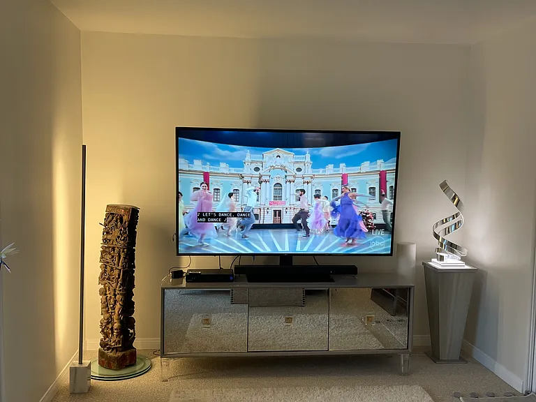 Primary bedroom 75" TV with Direct TV and all major streaming channels