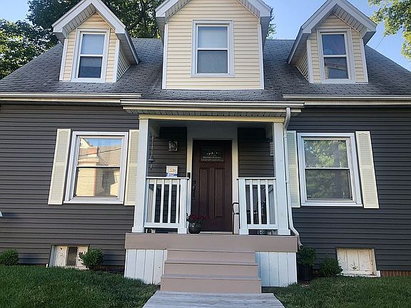 New porch, siding, fnt door!