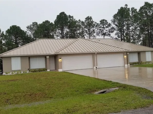 385/387 Carrillon Ave S, Lehigh Acres, FL 33974