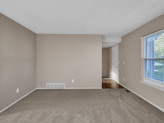 Living room looking towards front entrance.