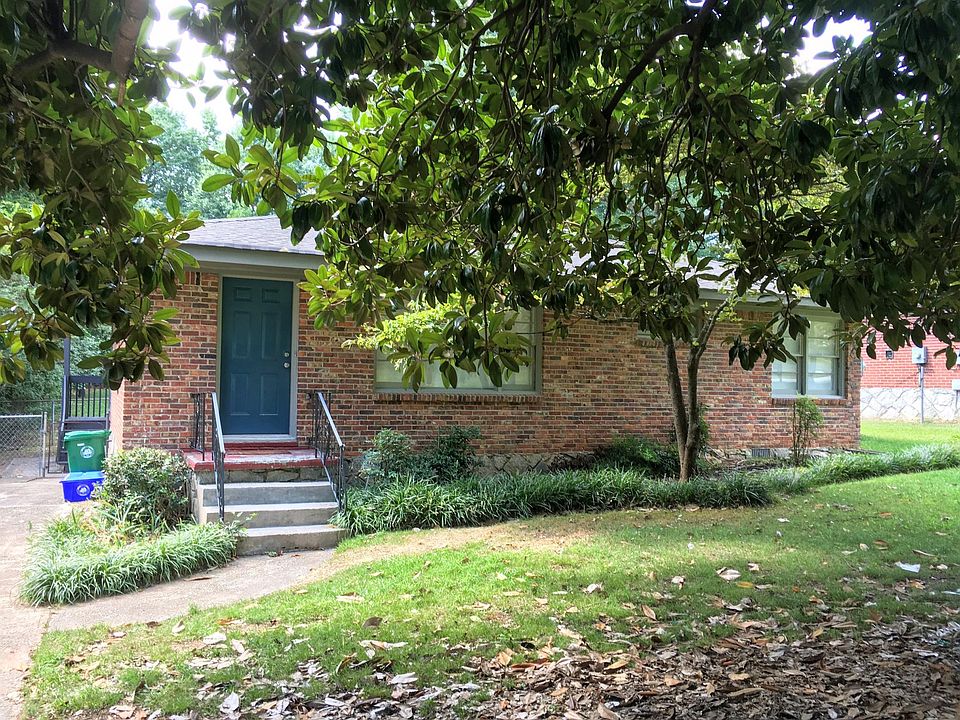 Nice magnolia provides shade and privacy.