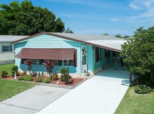 811 Oriole Cir, Barefoot Bay, FL 32976