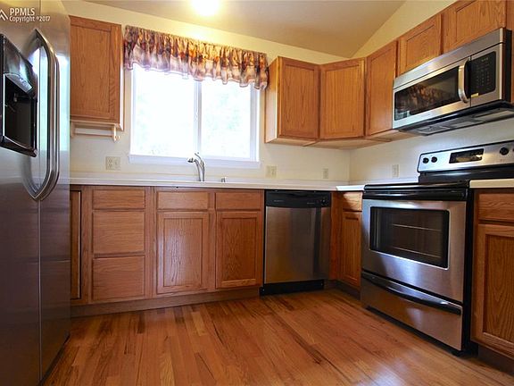 Stainless Appliances Including a Brand New Fridge and Microwave!