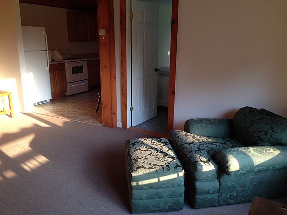 Living Room looking into 1 bedroom and kitchen
