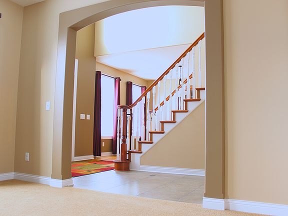 Formal living room view into foyer