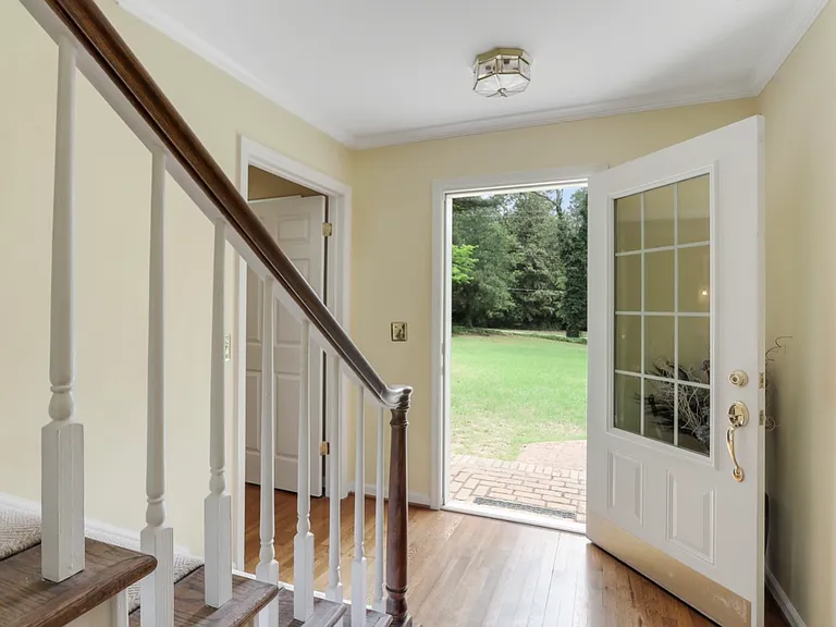The other main door to the right is the main master bedroom and 3 more bedrooms in the upstairs.