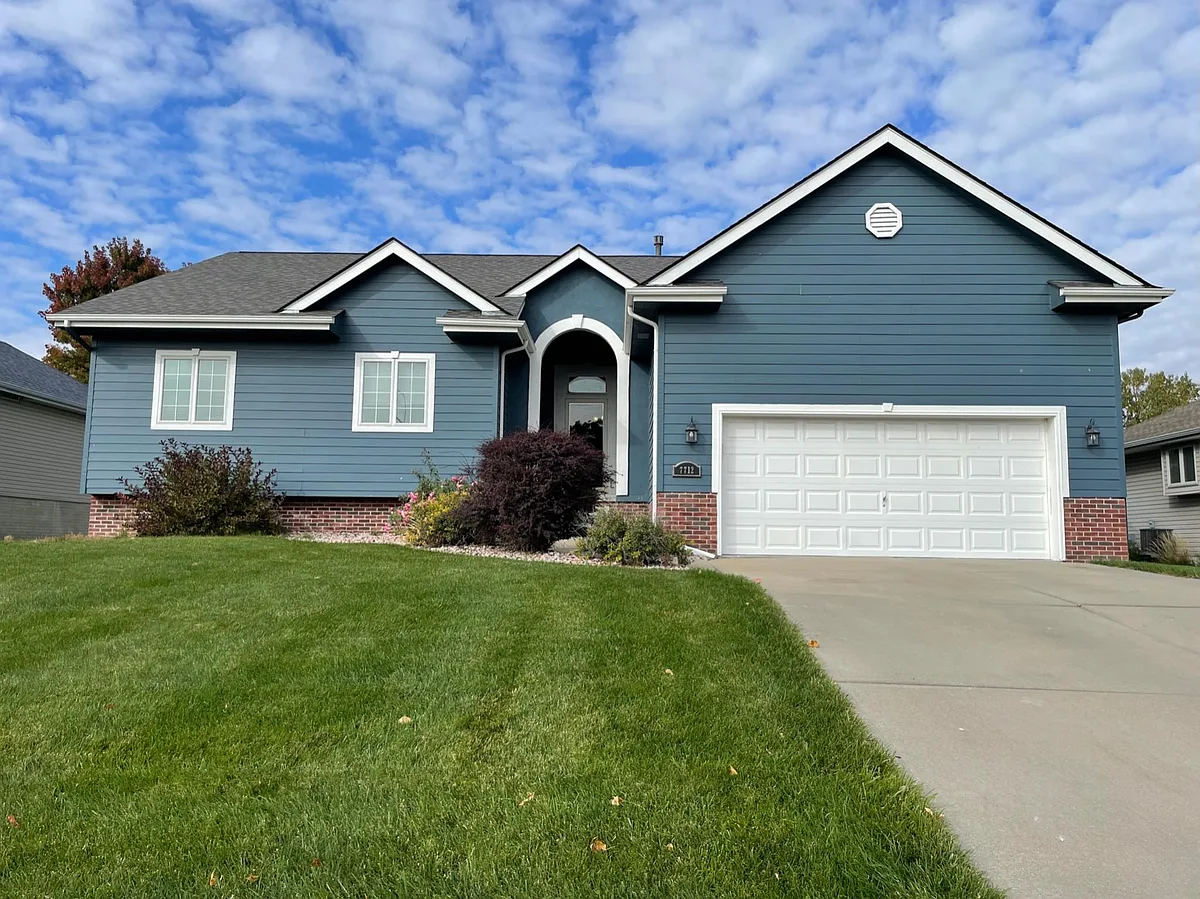 Photo 1 of 38 - 7712 S 166th St - Omaha, NE Gorgeous Front view with landscaping - 7712 S 166th St
