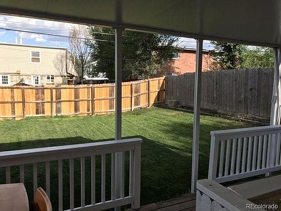 Beautiful back yard with dog run to the left out of view. Nice covered patio and off to left is also walkway to side gate to reserved storage shed and off street parking spot.