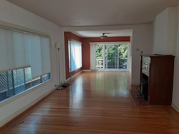 Living room opens into dining area