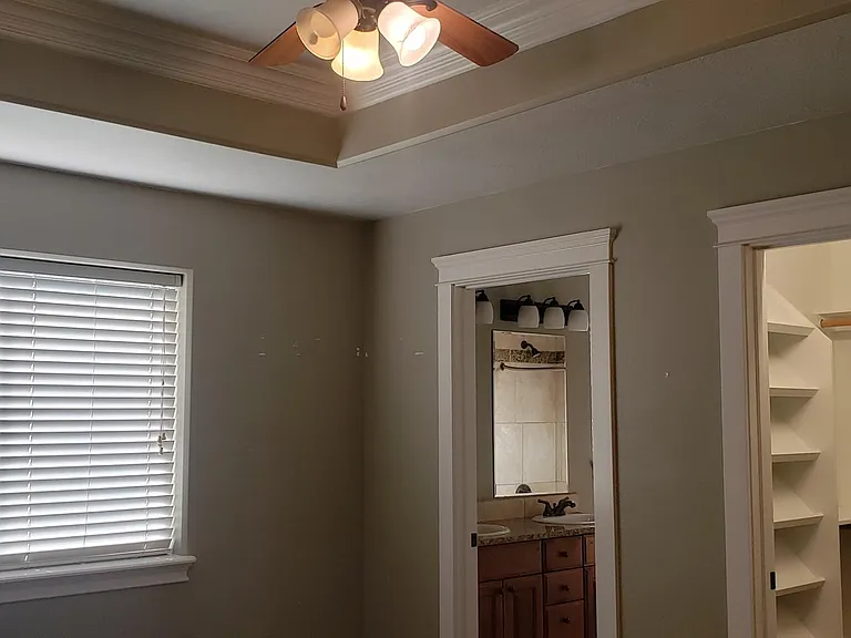 Owner's suite with private bath and walk-in closet.