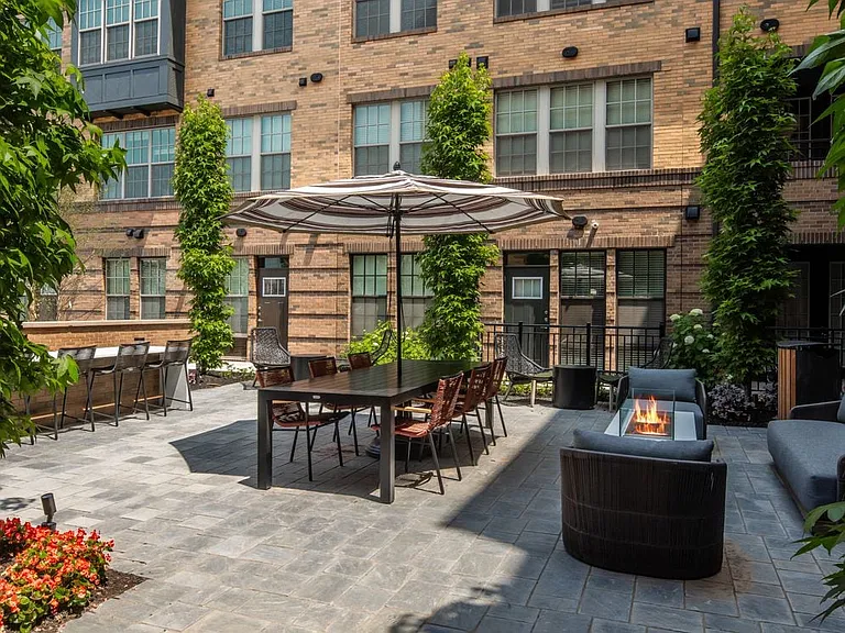 North Building Courtyard with outdoor lounge, seating, grills, and fire pit