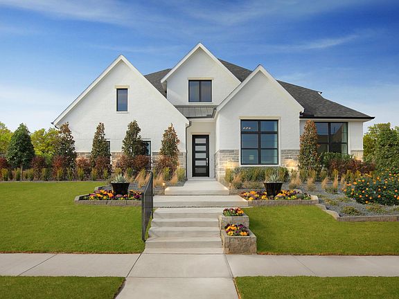 Custom home with brick and stone