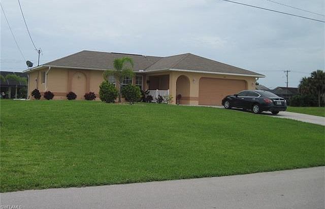 1st image of 902 NE Van Loon Ln